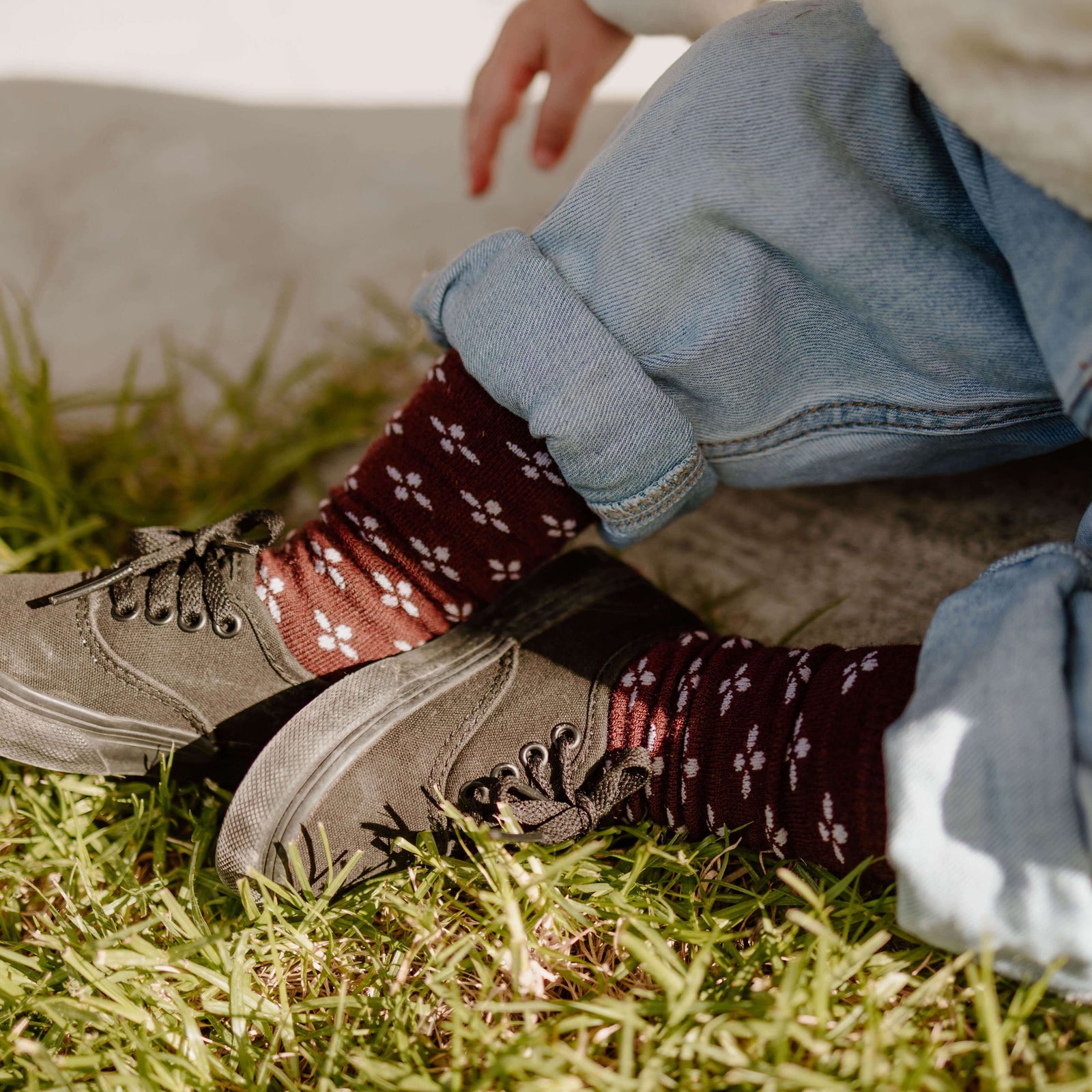 Lamington baby merino knee high socks in fig with lilac cross pattern made in New Zealand.
