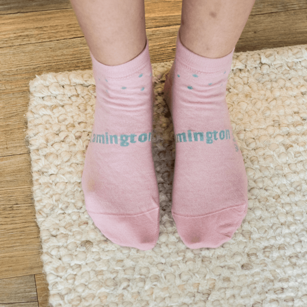Lamington women's merino ankle socks in blush pink with soft green spots made in New Zealand.