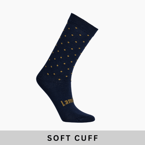 Lamington women's merino soft cuff crew socks in navy with mustard spots made in New Zealand.