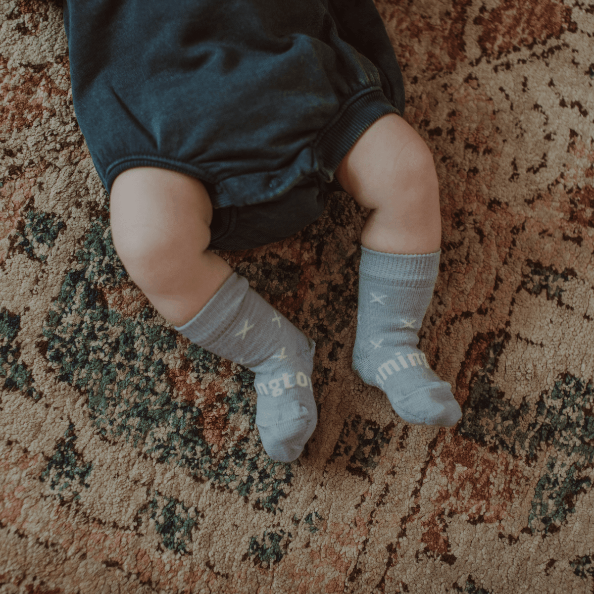 Merino Wool Crew Socks for Baby in Beau, light blue with natural cross pattern for newborns.