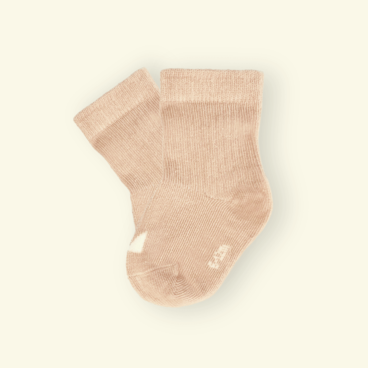 Mosey by Lamington organic cotton baby socks in oatmeal rib knit.