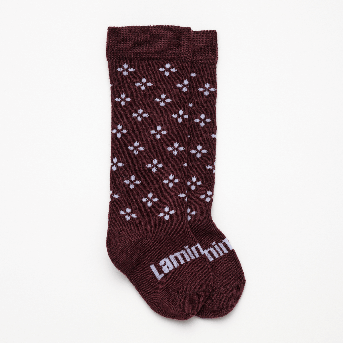 Lamington baby merino knee high socks in fig with lilac cross pattern made in New Zealand.