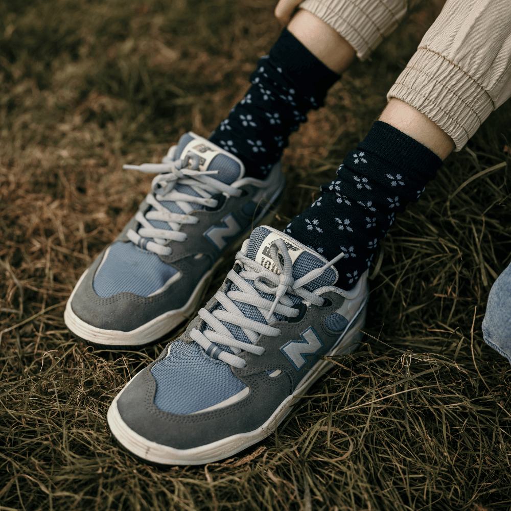 Lamington children's merino crew socks in navy with light blue cross pattern made in New Zealand.