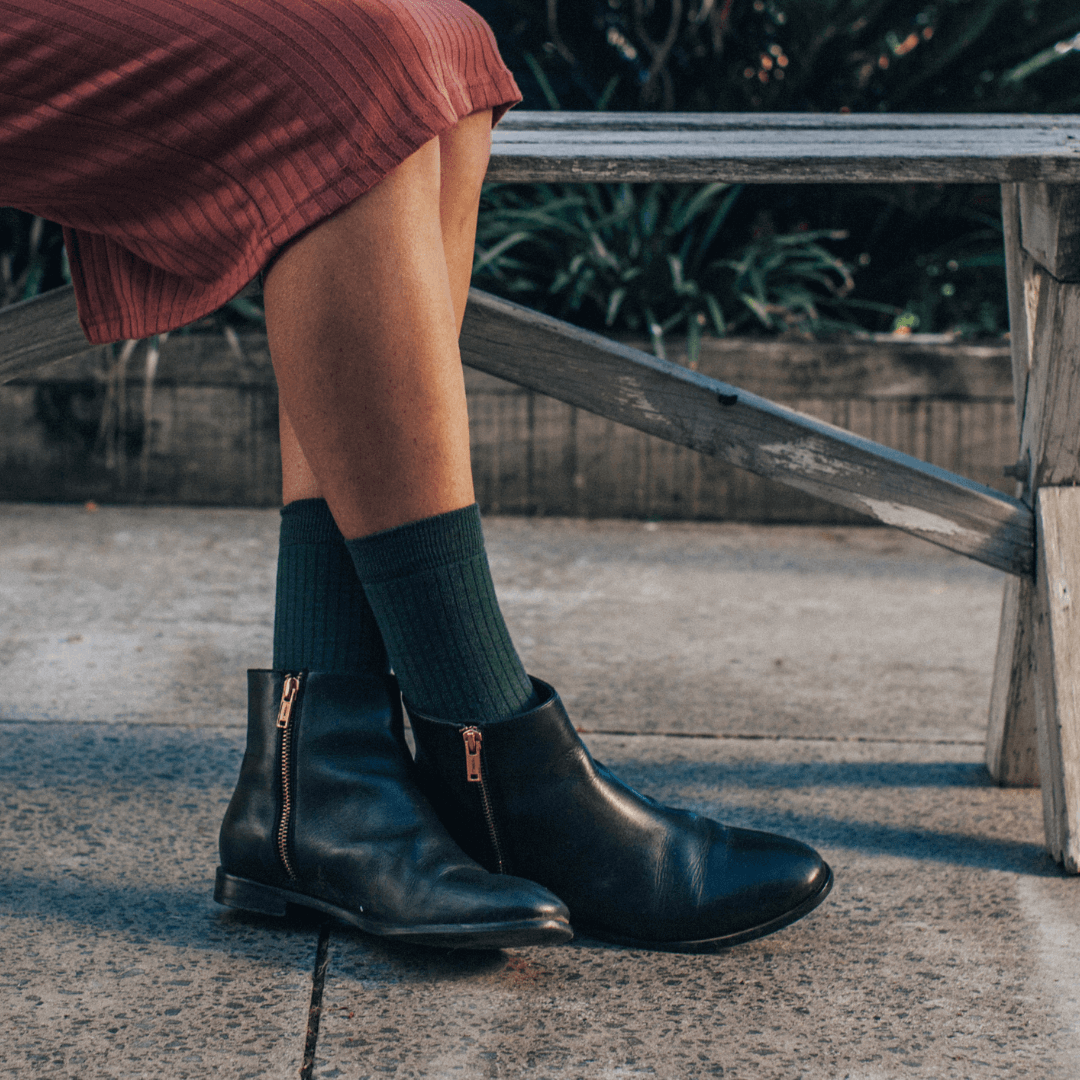Merino Wool Crew Socks in deep mossy green, designed for comfort and style for women.