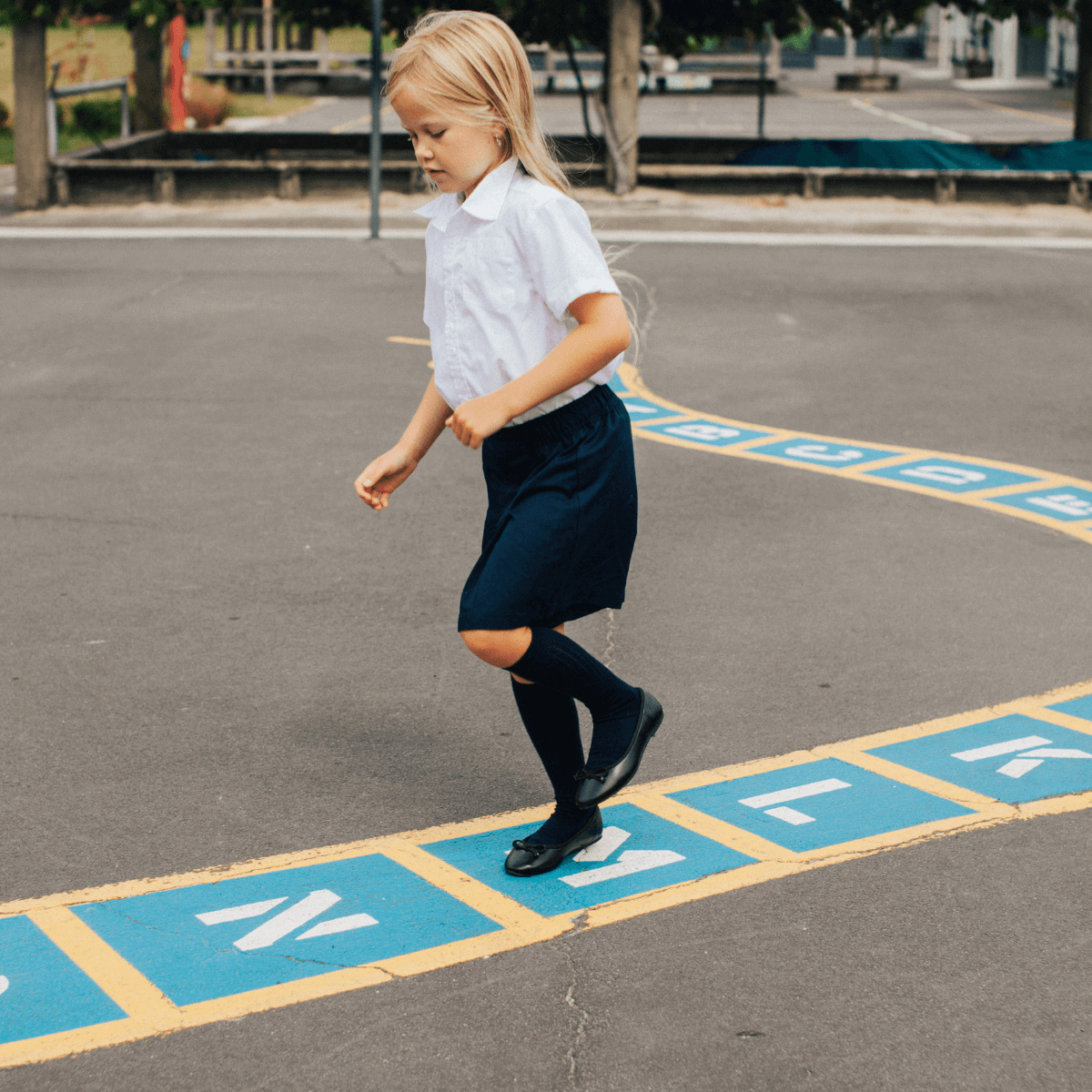 Merino Wool Knee High Socks for Children in Black from the Essential Collection, perfect for keeping little feet warm.