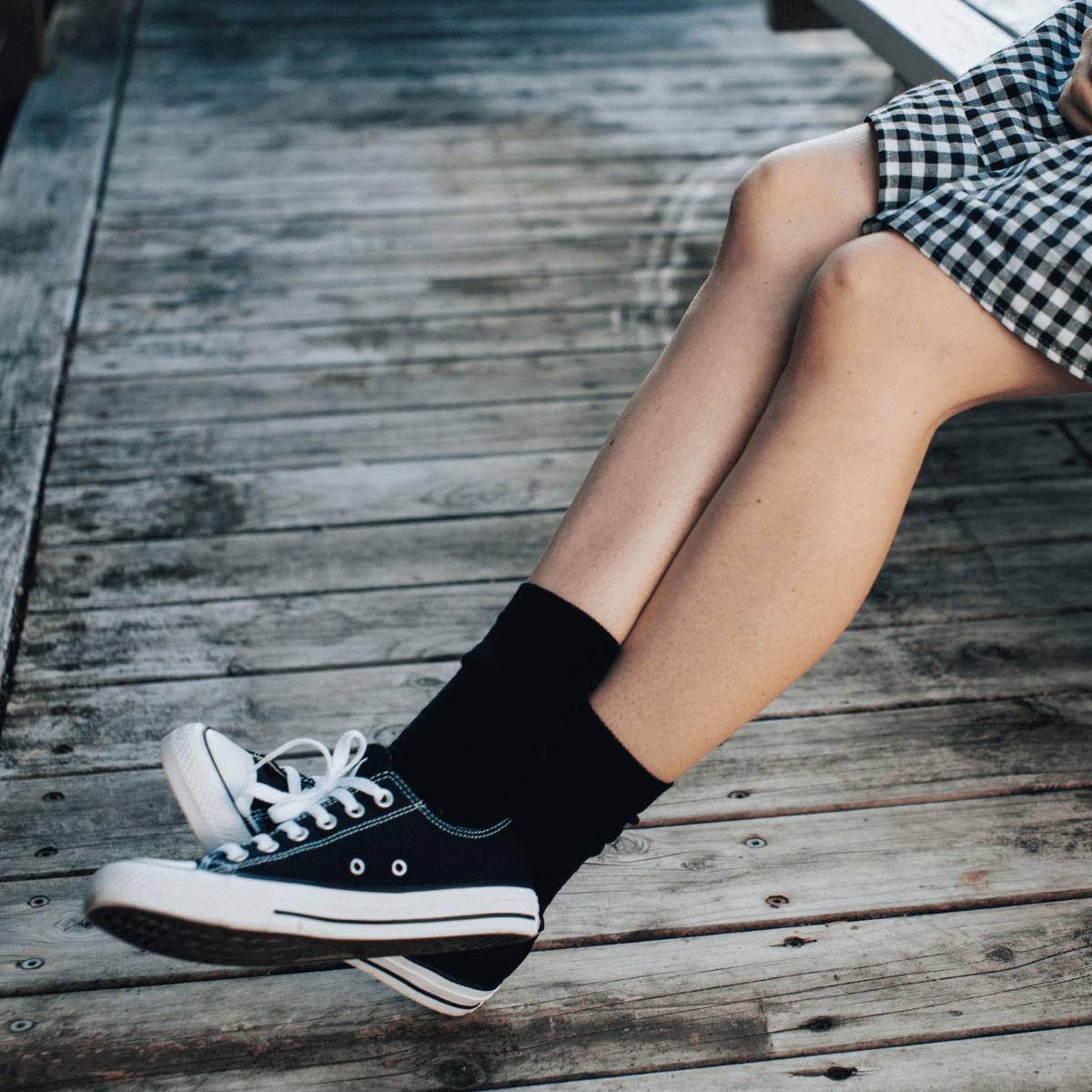 Merino Wool Crew Socks for Woman in Black from the Essential Collection, soft and breathable design.