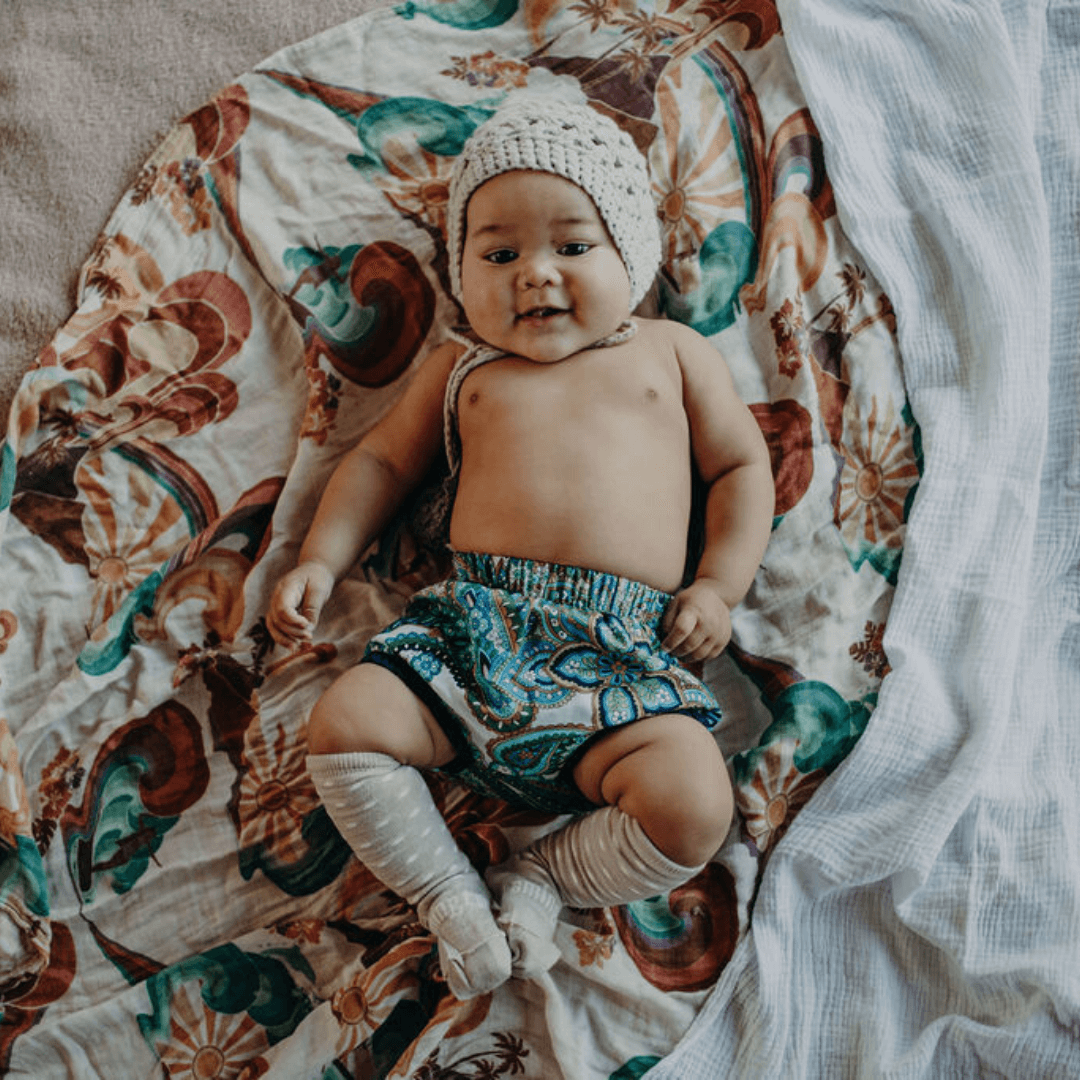 Merino Wool Knee High Socks for Baby in Truffle with white spots from the Newborn Natural Collection.